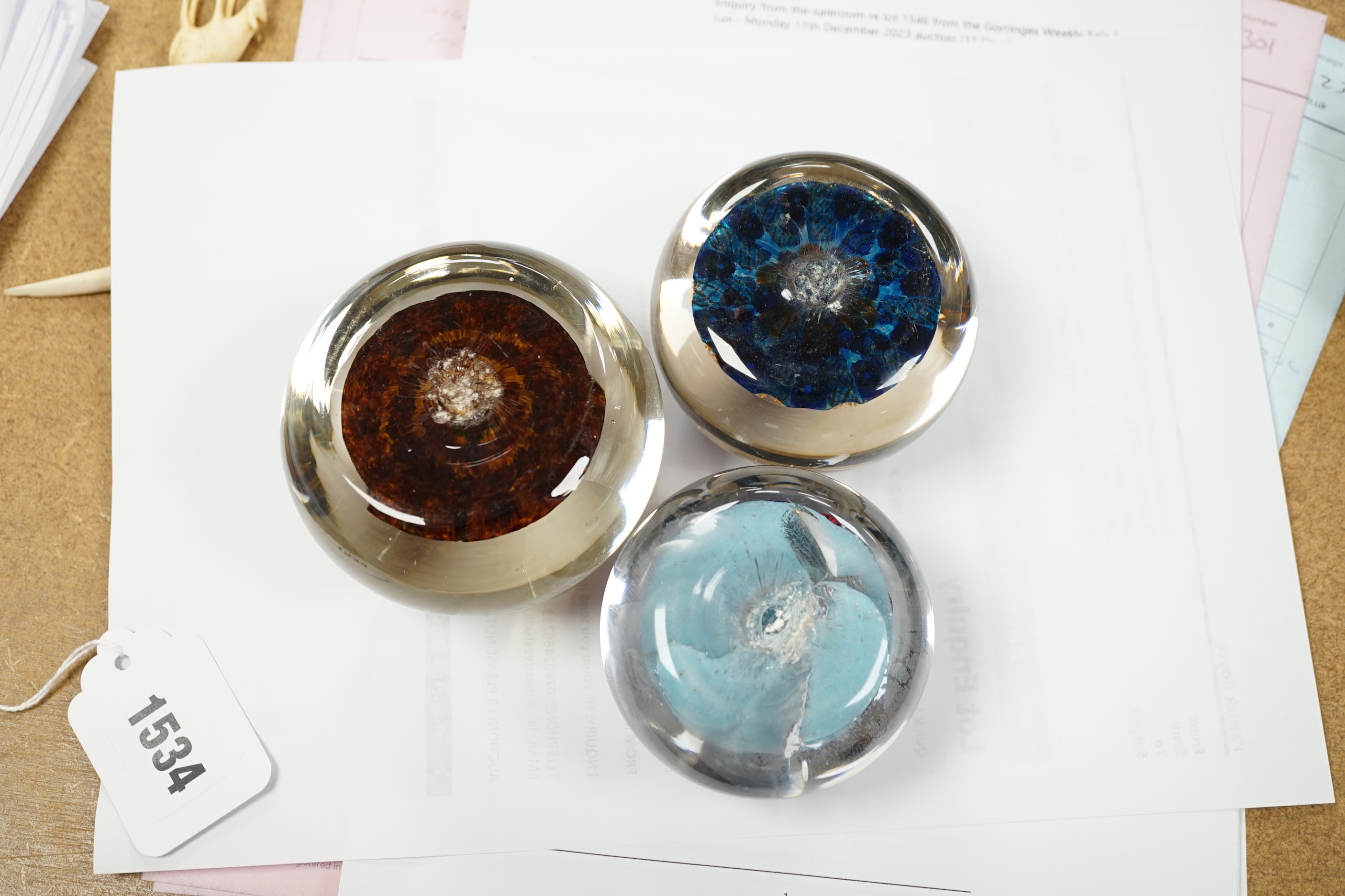 Three paperweights: one Perthshire and two others, Perthshire 6cm high